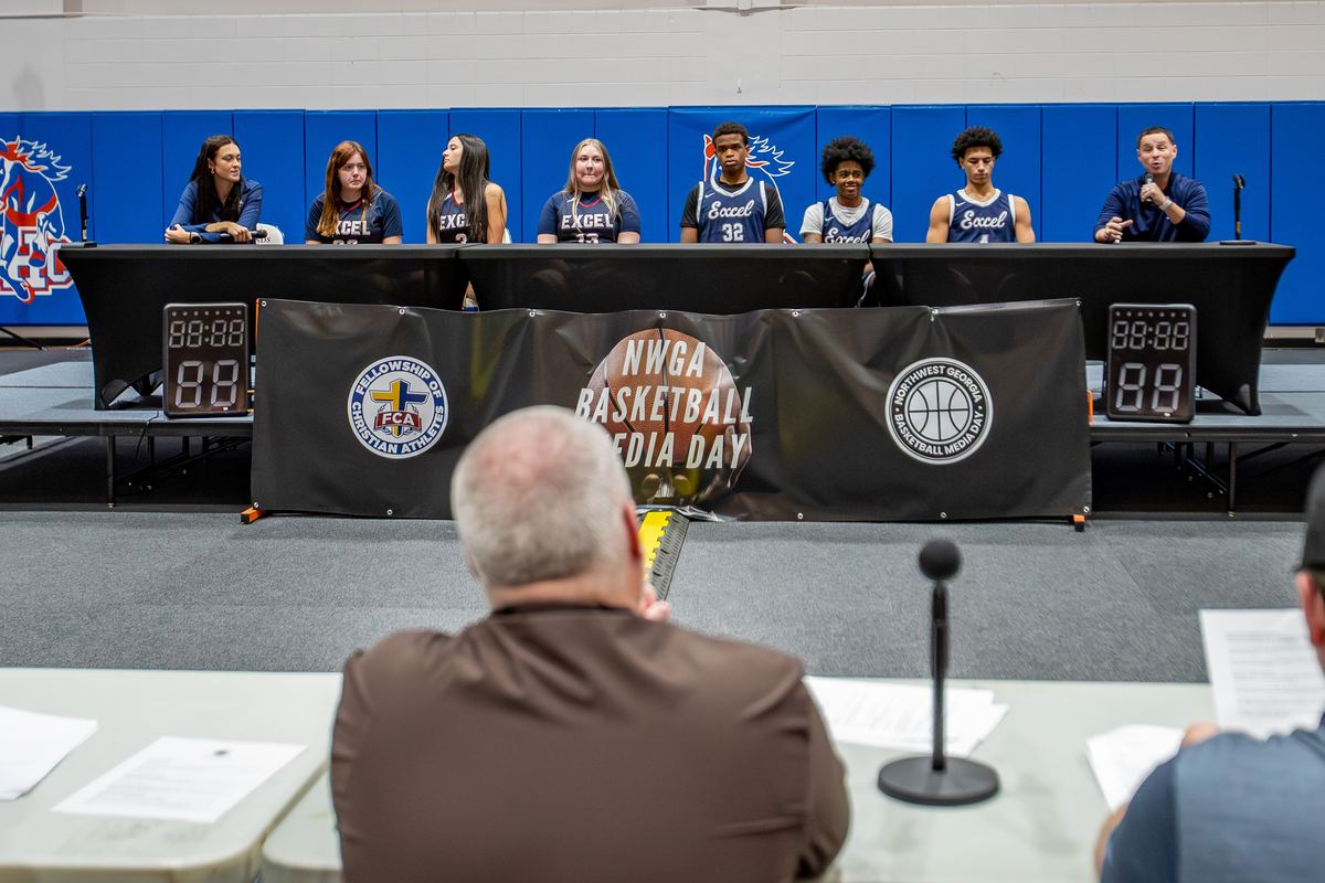 Excel players and coaches on the Media Day 2025 interview stage