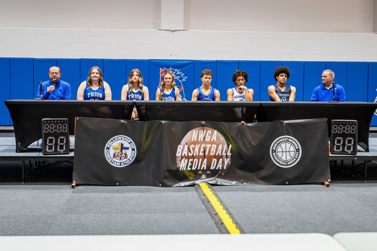 Trion players and coaches on the Media Day 2025 interview stage
